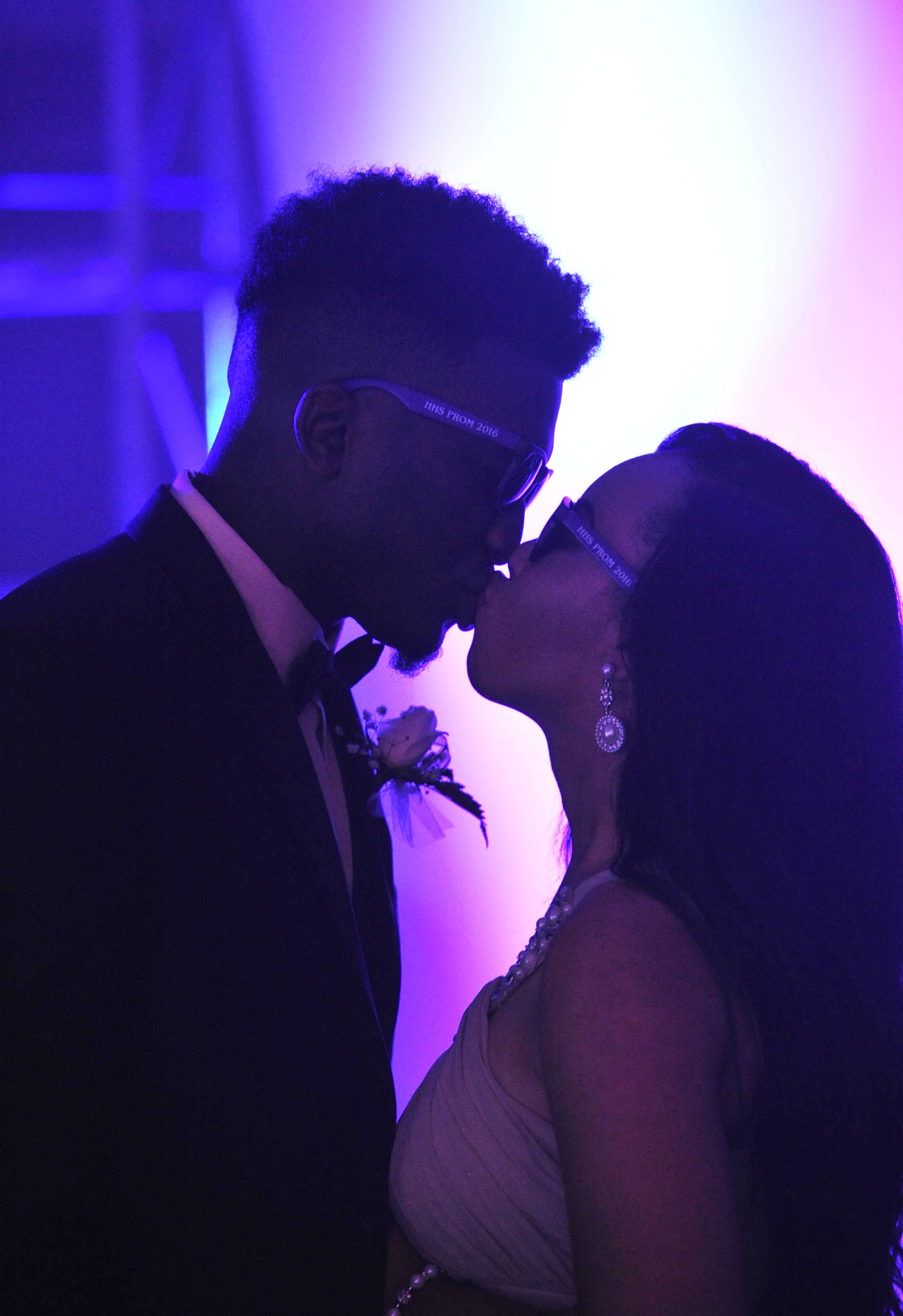 A couple kisses during prom (Eric Schultz / Rocket City Photo)